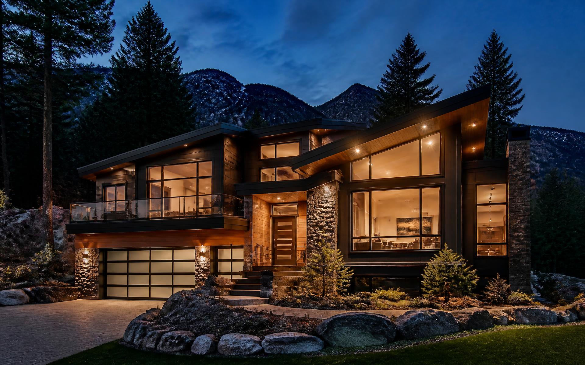 Modern West Coast home at dusk in the British Columbia mountains